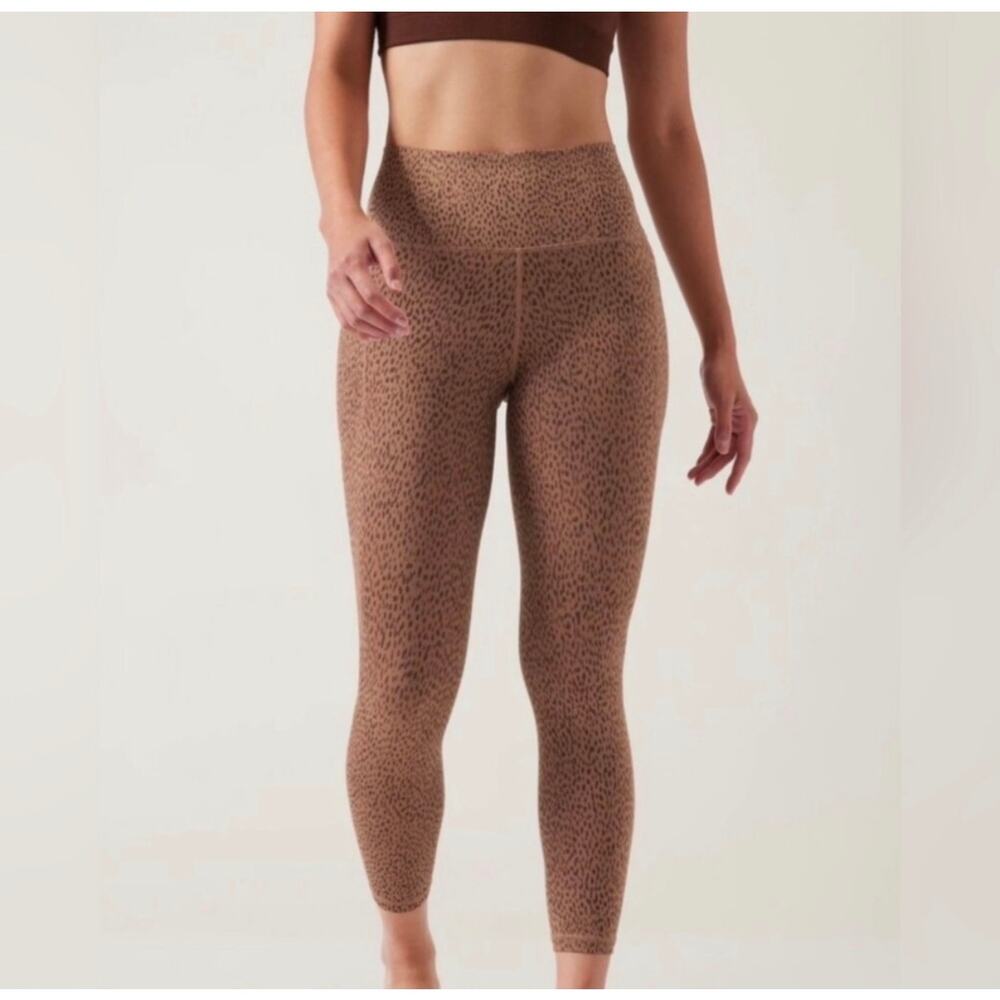 ATHLETA Salutation Stash Pocket Tights Size S 7/8 Length Leggings Animal Print
